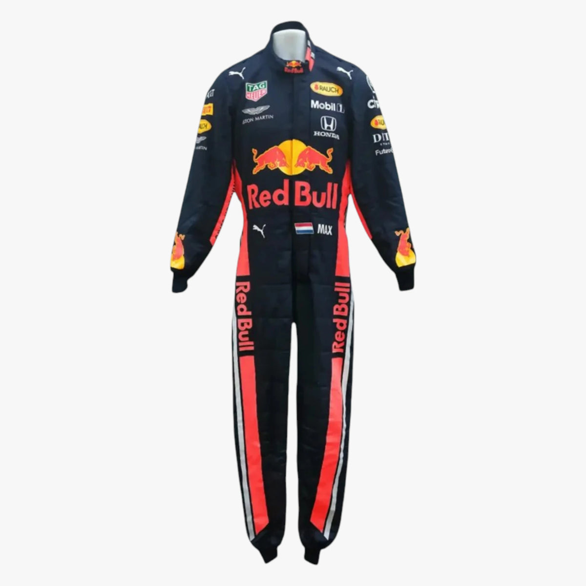 A Red Bull Racing long-sleeve racing suit on a white mannequin, featuring a navy blue base with prominent red and orange graphics, sponsor logos, and the Puma logo.