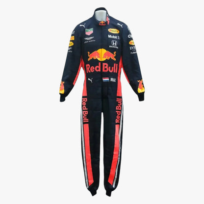 A Red Bull Racing long-sleeve racing suit on a white mannequin, featuring a navy blue base with prominent red and orange graphics, sponsor logos, and the Puma logo.