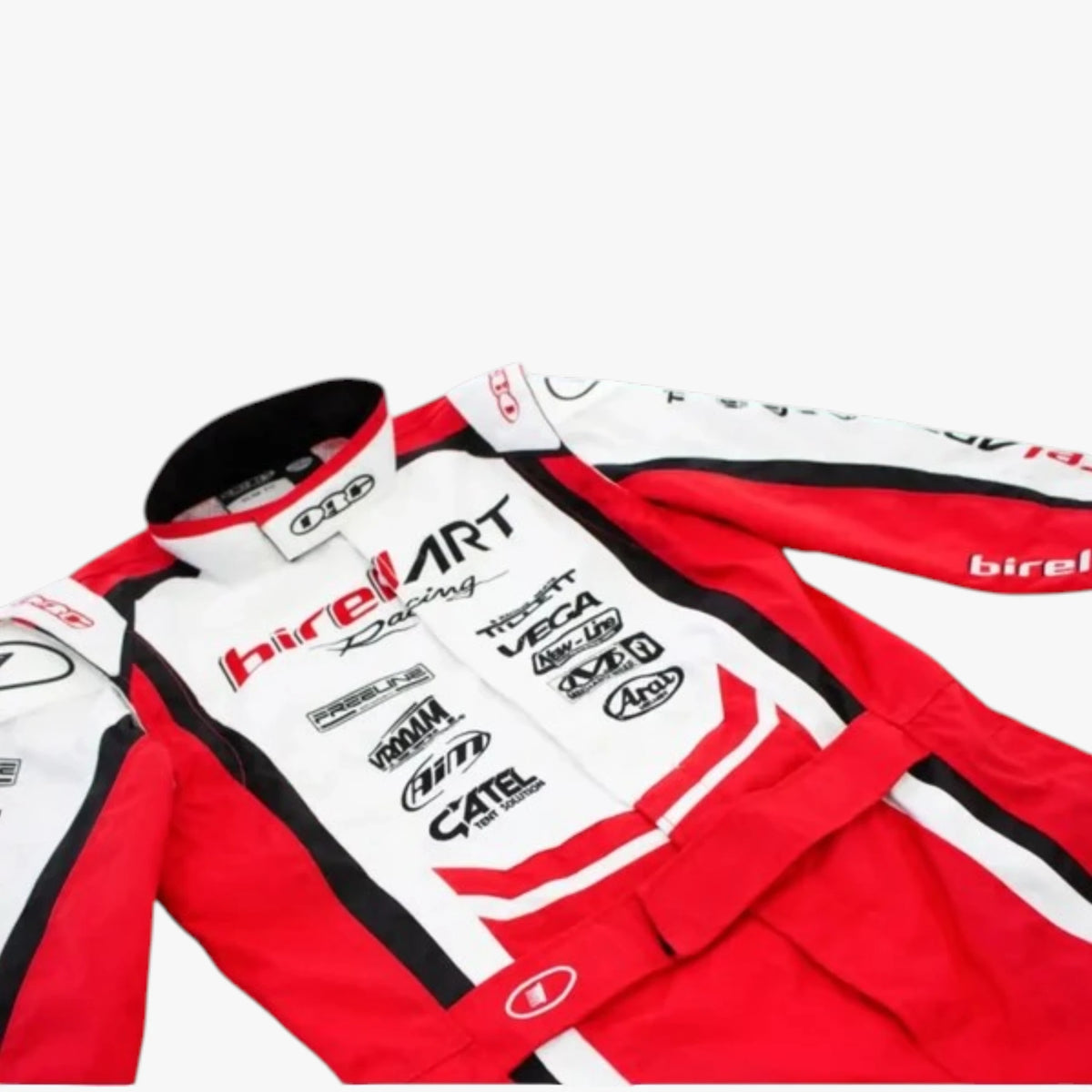 A red and white Birel ART Racing long-sleeve racing suit with black and red trim, featuring multiple sponsor logos including Yamaha, Castor, and Catech on the chest, laid flat against a light gray background.