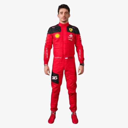 A man modeling a red Scuderia Ferrari full-body racing suit with black shoulder panels and various sponsor logos, paired with matching red racing shoes, against a plain light gray background.