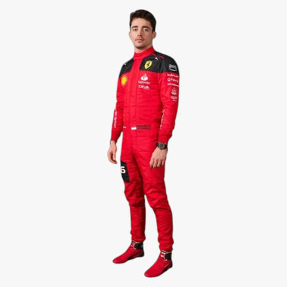 A man wearing a red and black Ferrari racing suit with sponsor logos, standing against a plain light gray background.
