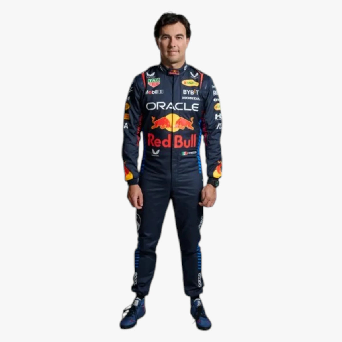 A full-body studio photo of a man wearing a dark Red Bull Racing team jumpsuit with prominent Oracle, Red Bull, and other sponsor logos, set against a plain light gray background.