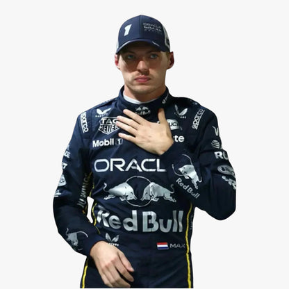 A man wearing a dark navy Red Bull Racing team jacket with sponsor logos and a matching cap, posed against a plain light gray background.