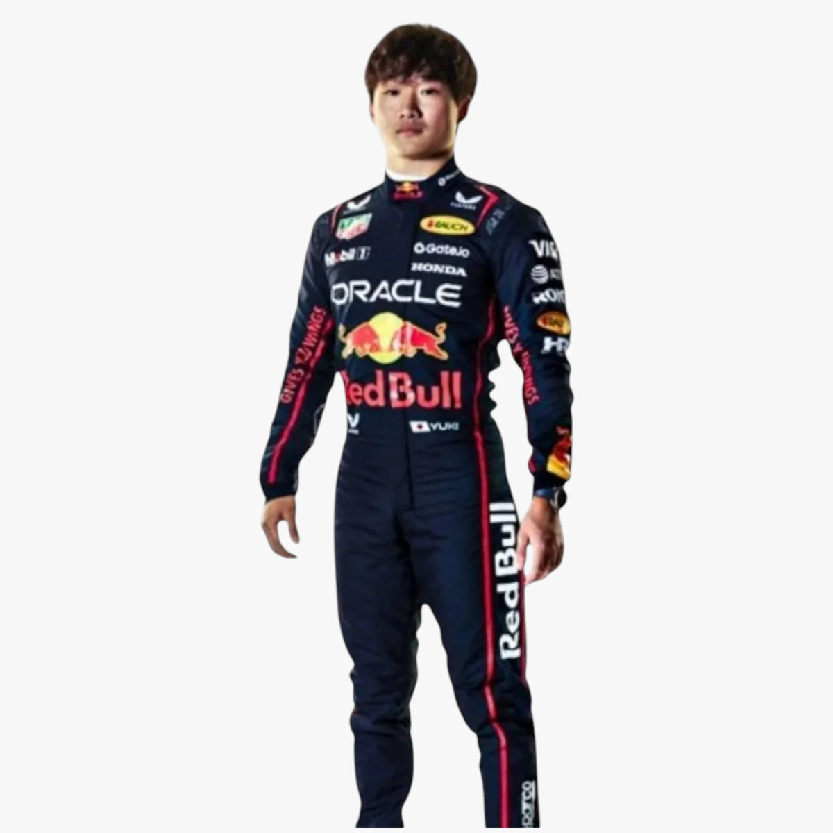 A man wearing a Red Bull Racing team racing suit with various sponsor logos, standing against a plain white background.