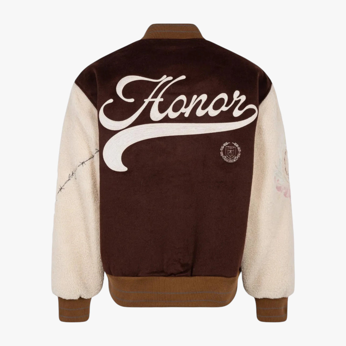 Back view of a varsity-style jacket with a dark brown velvet body, cream sherpa sleeves, and a large white script 'Honor' graphic across the back.