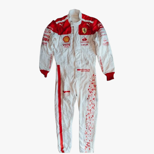A white and red Scuderia Ferrari racing one-piece suit with sponsor logos including Ferrari, Shell, and Puma, displayed against a light gray background.