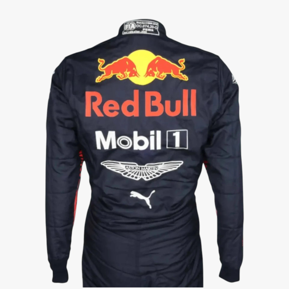 Back view of a Red Bull Racing team long-sleeve racing suit in navy blue, featuring large sponsor logos including Red Bull, Mobil 1, Aston Martin, Puma, and Castore on the back.