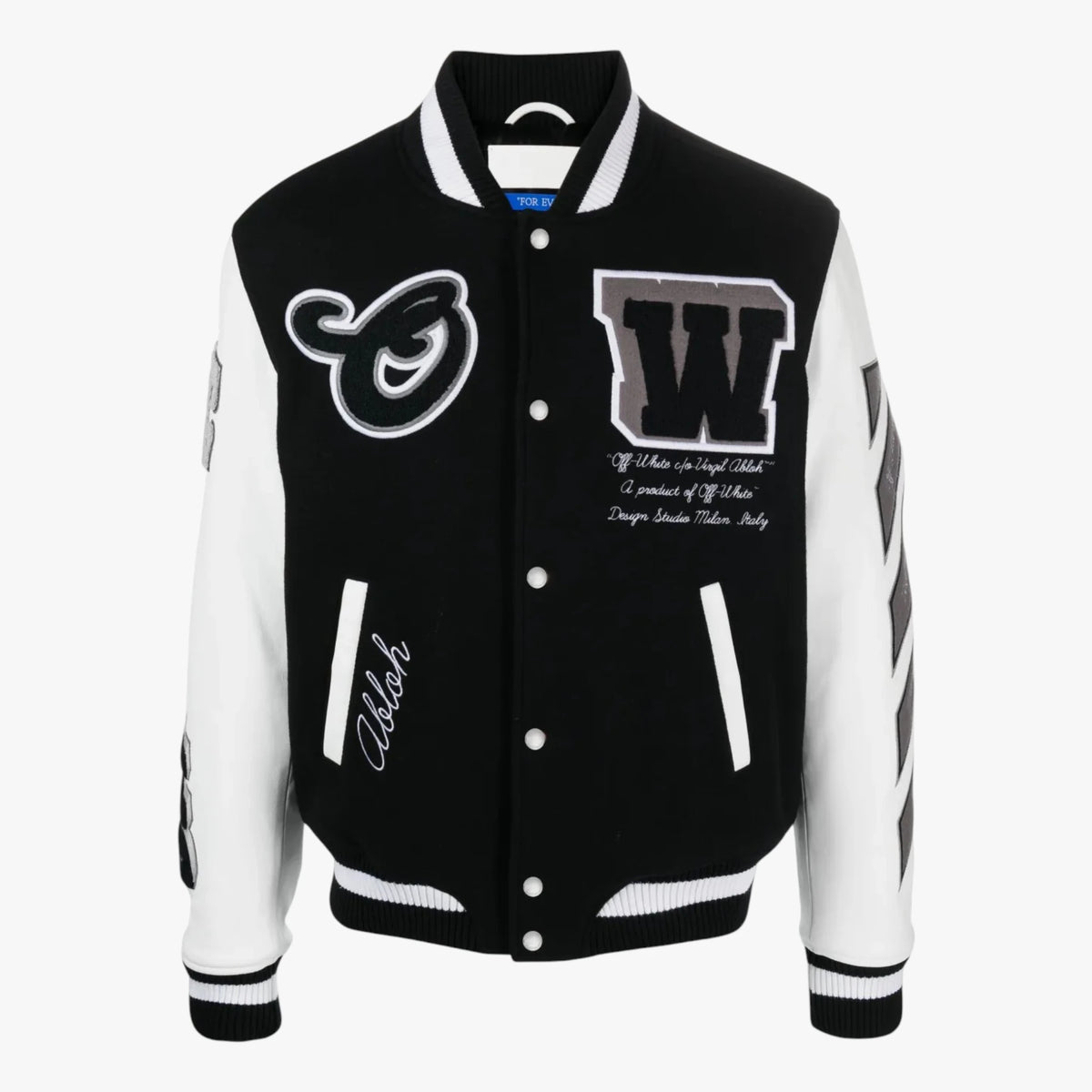 A black and white varsity jacket with white ribbed trim, featuring a large white 'W' patch with embroidered text on the left chest, a white script 'C' patch on the right chest, and white embroidered script on the lower left pocket.