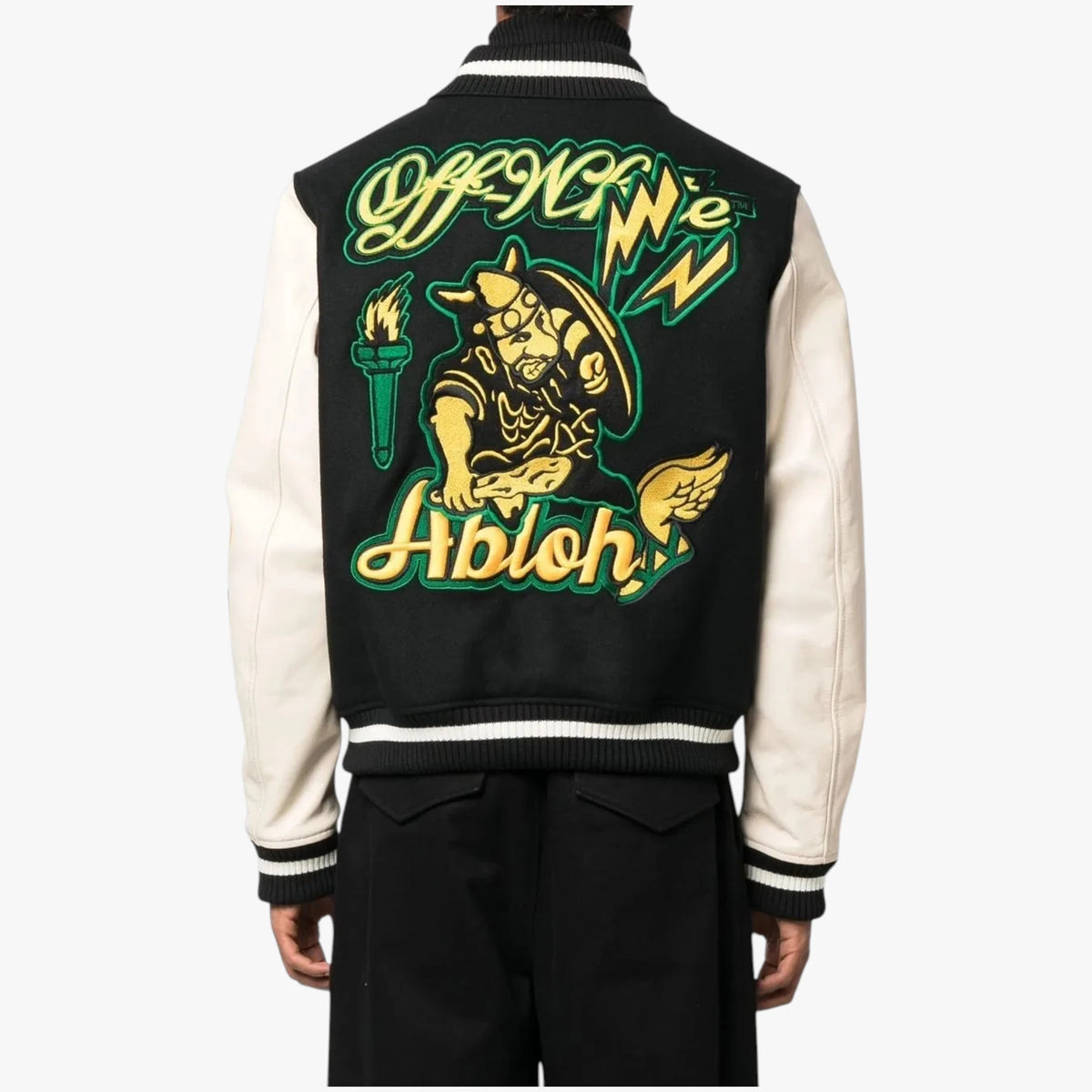 A person shown from the back wearing a black and cream varsity-style jacket with a large embroidered graphic on the back. The design features green and yellow lettering reading 'Off-White x Abloh' and a central illustrated figure with a torch.