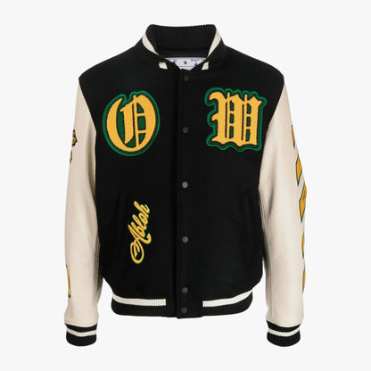 A varsity-style letter jacket with a black body, cream sleeves, and green and yellow embroidered details, including a large 'D' and 'M' on the chest and 'Allah' on the lower left front.